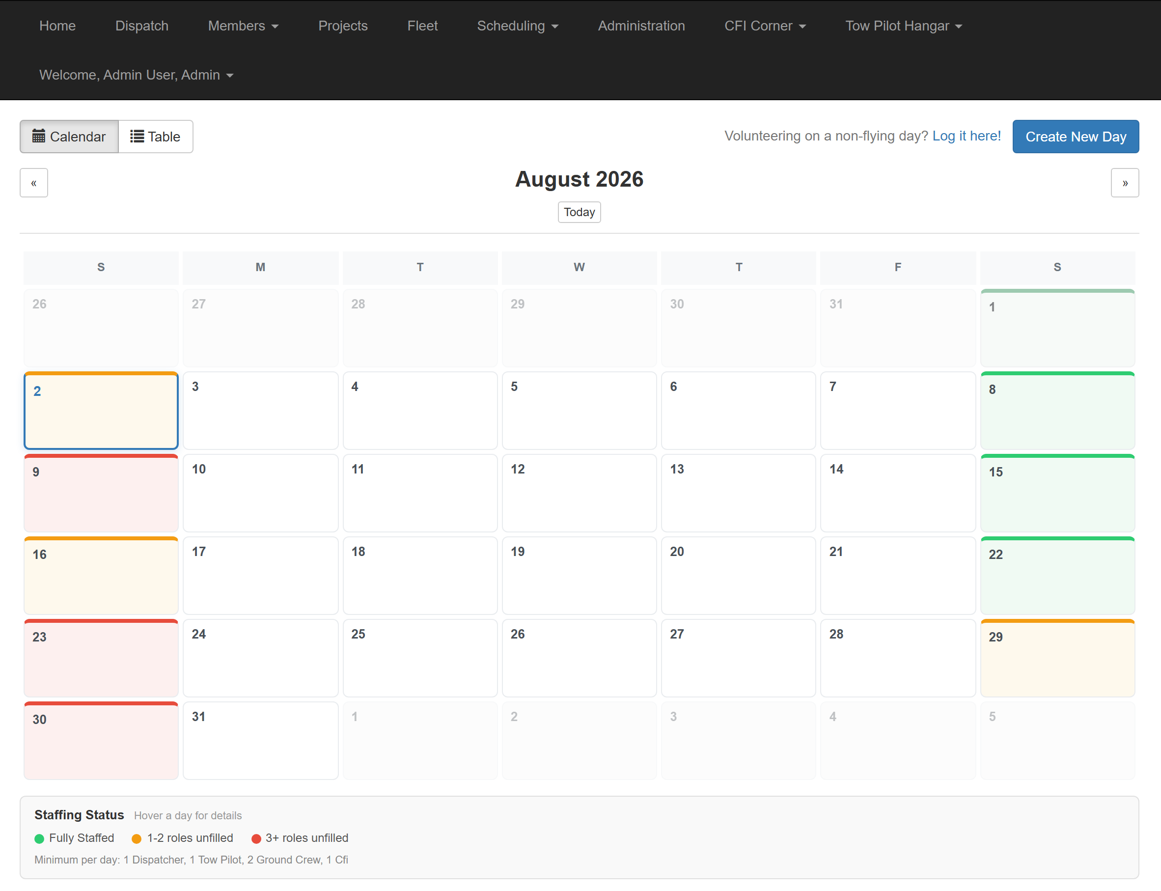 GliderOps scheduling calendar showing flying days and staffing status